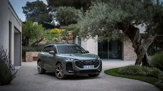 Audi вернула культовый кроссовер с гибридом: 119 км без капли бензина и OLED-фары